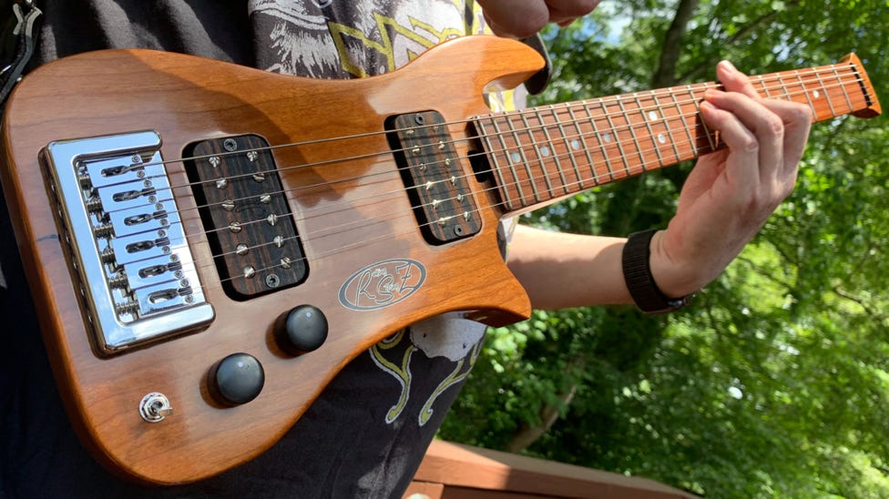 Peachtree Bridge on Cherry Trouper Travel Guitar being played