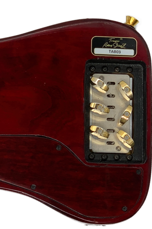 Back of Red Trouper Travel Guitar with Gold Peachtree Bridge